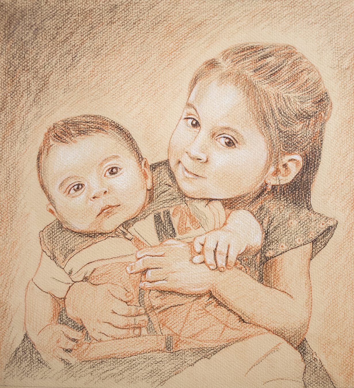 Retrato de dos niños a lápiz sanguina